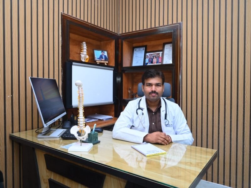 Dr. Tejo Phanindra P at his consultation desk