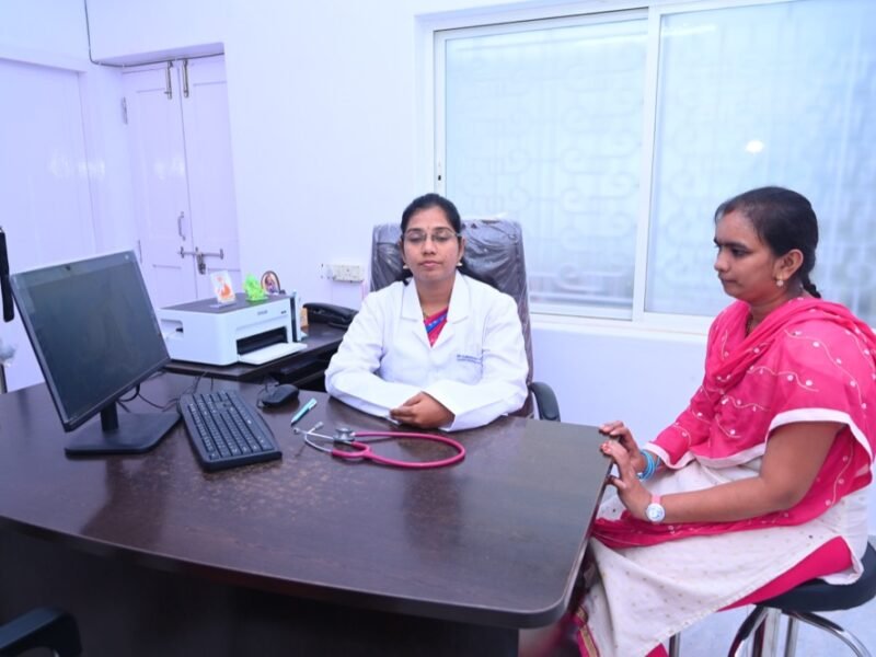 Dr. Lakshmi Mrudula V consulting a patient